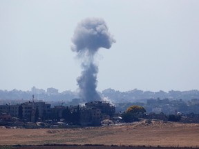 Smoke rises after an explosion in the northern Gaza Strip July 15, 2014. Israeli air strikes resumed in the Gaza Strip on Tuesday, Reuters witnesses said, six hours after Israel unilaterally entered an Egyptian-proposed truce that was never accepted by Palestinian militants who kept up cross-border rocket fire. REUTERS/Baz Ratner