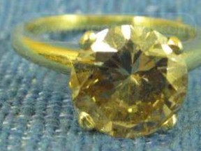 Goodwill employees discovered this 3-carat diamond ring among piles of donated second-hand clothes and shoes. (Handout)