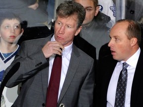 New Marlies head coach Gord Dineen (left) chats with ex-Marlies head coach/current Maple Leafs assistant Steve Spott last season. (Maple Leafs photo)