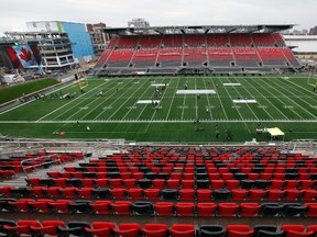 Construction crews continue to work on TD Place at Lansdowne Park on Tuesday July 15, 2014. The Ottawa RedBlacks p;ay their home opener there Friday,July 18, 2014.
Tony Caldwell/Ottawa Sun/QMI Agency
