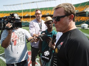 Head coach Chris Jones speaks with media after an Edmonton Eskimos practice. (Ian Kucerak, Edmonton Sun)