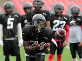 The Redblacks practice at TD Place at Lansdowne Park on Tuesday July 15, 2014. RedBlack Jerrell Gavins catches a pass during practice. The RedBlacks play their home opener on Friday, July 18, 2014 against a beat up Toronto Argonaut squad.  
Tony Caldwell/Ottawa Sun/QMI Agency