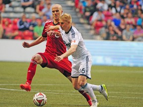 TFC’s Michael Bradley, seen here facing Vancouver in May, will play tonight against the Whitecaps after sitting out on Saturday. (USA TODAY SPORTS)