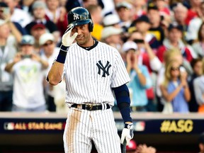 American League shortstop Derek Jeter of the New York Yankees waves to the crowd as he comes up to bat during the MLB All Star Game at Target Field in Minneapolis, July 15, 2014. (SCOTT ROVAK/USA Today)