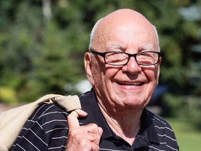 Rupert Murdoch, CEO of 21st Century Fox, smiles at the Allen and Co's annual media conference in Sun Valley, Idaho July 10, 2014.    REUTERS/Rick Wilking