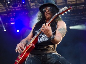 Slash is seen performing at Bluesfest in Ottawa on Friday July 11, 2014. Errol McGihon/QMI Agency