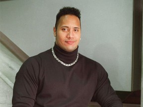 Dwayne “The Rock” Johnson -  then known as Rocky -  poses as a SUNshine Boy in 1997. (Photo: Kate ​MacConnell, QMI Agency)