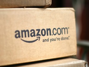 A box from Amazon.com is pictured on the porch of a house in Golden, Colorado in this file photo taken July 23, 2008.  REUTERS/Rick Wilking/Files