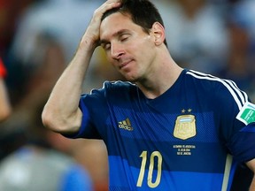 Argentina's Lionel Messi reacts after losing to Germany in their extra time in their 2014 World Cup final at the Maracana stadium in Rio de Janeiro  July 13, 2014. (REUTERS/Eddie Keogh)