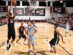 Raptors’ Lucas Nogueira (left) needs to put on weight if he wants to bang with the big boys in the NBA. The centre is averaging six points in 19 minutes a game at Summer League. (AFP)