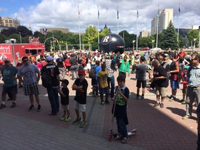 Fans gather for a noon-hour pep rally for the Ottawa RedBlacks at City Hall. (TONY CALDWELL Ottawa Sun)