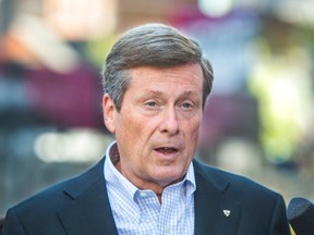 Mayoral candidate John Tory at a press conference on Thursday July 17, 2014. (ERNEST DOROSZUK/Toronto Sun)