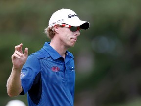 Canada's David Hearn finished the first round of the British Open with a two-under-par 70 at Royal Liverpool in Hoylake, England on Thursday, July 17, 2014. (Mathieu Belanger/Reuters/Files)