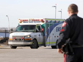 An AHS ambulance drops a patient off at a hospital during an emergency situation. A group pitched a non-emergency transportation service for seniors to MD council saying it could take pressure off EMS. Darren Makowichuk photo/QMI Agency