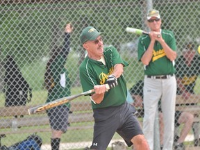 Jim Kirkup of the Portage Agri Sales team takes a swing during day two of the Portage Senior Slo-Pitch Tournament July 17. (Kevin Hirschfield/The Graphic/QMI AGENCY)