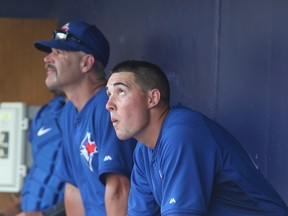 There is speculation Aaron Sanchez, shown looking on from the dugout during spring training, could join the Jays in the second half. (VERONICA HENRI/TORONTO SUN)