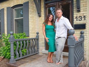 Sylvie and Andy Roth stand on the front steps of their Sydenham St. home (CRAIG GLOVER, The London Free Press)
