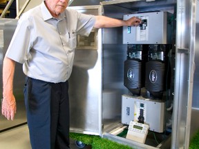 Gary La Voie is part of the team that created a private power plant that can be added to any home to provide battery backup in case power goes out. (MIKE HENSEN, The London Free Press)