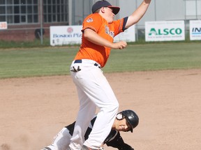 A runner slides in safely ahead of the throw during the ‘Sox three-game sweep of the Oil Giants in Fort McMurray earlier this month. - Robert Murray, Fort McMurray Times
