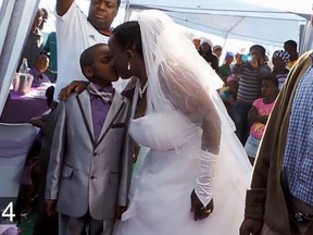 Saneie Masilela, a nine-year-old South African boy, walked down the aisle as the groom when he married a 62-year-old woman for the second time.
(Screenshot from YouTube)