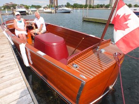 Jan and Allan Anderson sit in their 1954 Chris Craft boat, named "Always Hanging Out," in the Sarnia Bay Marina. The boat, and other vintage ships, will be on display during the Annual Antique and Classic Boat Show Saturday. BRENT BOLES / THE OBSERVER / QMI AGENCY