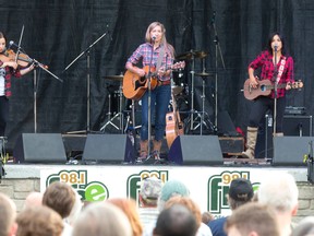 Trent Severn, comprised of Laura C. Bates, left, Dayna Manning, middle, and Emm Gryner perform on the main stage at the Home County Music & Art Festival in Victoria Park. (Craig Glover/The London Free Press)