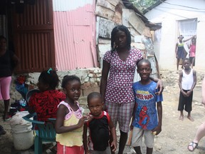 Supplied photo
A Haitian mother and her children in the Munoz settlement.