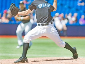 Jays pitcher Brad Mills was recalled to work long relief while Deck McGuire was designated for assignment. (TORONTO SUN FILES)