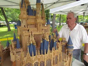 Don Percival stands with the scale model of Cinderella's Castle he hand-carved, and brought out to Sarnia's 25th annual Hobbyfest, held Sunday in Canatara Park. Nearly 50 groups manned displays in the park during the free event. PAUL MORDEN/THE OBSERVER/QMI AGENCY