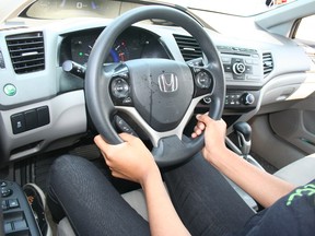 Patricia's steering wheel is still stained after a road rage incident in June when an angry driver tailgating her eventually pulled up along side of her and threw a soft drink into her open driver's-side window. (Terry Davidson/Toronto Sun)