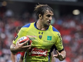 A file picture taken on October 5, 2013 at the Allianz Riviera stadium in Nice, southern France shows Clermont's lock Julien Pierre during the French Top 14 rugby union match Toulon vs Clermont-Ferrand.  A dozen armed men attacked French rugby union internationals Aurelien Rougerie, Julien Pierre and Benjamin Kayser with machetes as they walked back to their hotel at night, their club said July 20, 2014. (AFP PHOTO / JEAN CHRISTOPHE MAGNENET)