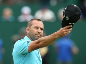 Spain's Sergio Garcia reacts on the 18th green after his fourth round 66, on the final day of the 2014 British Open Golf Championship at Royal Liverpool Golf Course in Hoylake, north west England on July 20, 2014. (AFP PHOTO / ANDREW YATES)