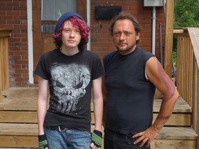 Sixteen-year-old David Wood reported being the victim of a frightening gunpoint robbery early Saturday, July 19, 2014 in his own front yard in Carlington; his dad, Steve, fears the neighbourhood isn't safe and is frustrated that police aren't doing more about it.
MEGAN GILLIS/OTTAWA SUN/QMI AGENCY