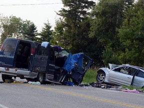 A serious collision involving a multi-passenger van and a car resulted in injuries to 10 victims, including six children, on Perth Road 113 south of Stratford, Ont., on Sunday, July 20, 2014. 
SCOTT WISHART/The Beacon Herald/QMI Agency