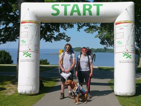 Ben Robinson, left, and Tyson Montgomery, with their mascot Utah, at the start line for Hit the Trail on July 12.  Submitted photo
