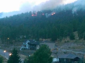 Photo courtesy Pete Warren showing a forest fire in Kelowna, B.C., July 17, 2014. 
(Pete Warren/Calgary Sun/QMI Agency)