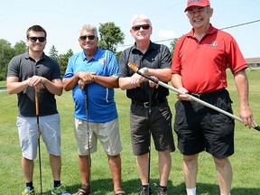 From left: Anthony Basciano, his grandfather, Tony, Jeff Rexe (Steve's youngest brother) and Ralph DeCarlo get set to tee off at the inaugural Steve Rexe Memorial golf tournament last weekend at the BQCC. (ZACHARY SHUNOCK/The Intelligencer)