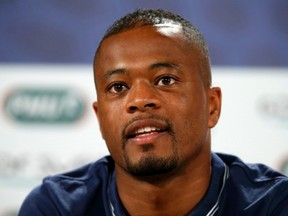 France's national soccer player Patrice Evra attends a news conference at the theatre Pedro II at Ribeirao Preto, northwest of Sao Paulo, June 18, 2014.   (REUTERS)