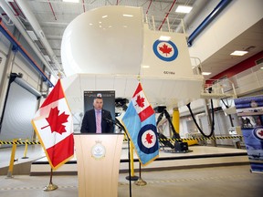 James Bezan, Parliamentary Secretary for the Minster of National Defence, announces, on behalf of Minister Rob Nicholson, amendments to the Operational Training Systems Provider worth more than $32.5 millions, which will align the C-130J Hercules training systems with ongoing upgrades, such as flight simulators (above), during a press conference held at the Air Mobility Training Centre at 8 Wing/CFB Trenton Monday, July 21, 2014. - Jerome Lessard/The Intelligencer/QMI Agency