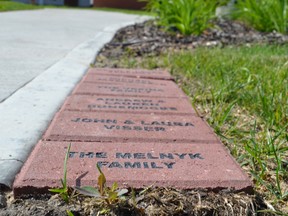 The first paving stones in Valour Place's Pathway to Valour initiative, given names of early supporters and families with the facility. Valour Place hopes supporters will purchase a stone, which will line the walk-way to the building, to help grow its endowment fund. Doug Johnson/Edmonton Examiner/QMI Agency
