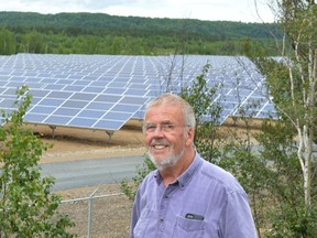 Jim Moodie/The Sudbury Star
Ward 7 Coun. David Kilgour stands in front of the HighLight solar plant on the outskirts of Capreol. The panels span 125 acres and number nearly 50,000.