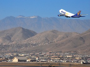 A World Atlas Boeing 747 aircraft takes off from Kabul international Airport, Kabul, Afghanistan, Dec. 13, 2010.
9Photo courtesy U.S. navy)