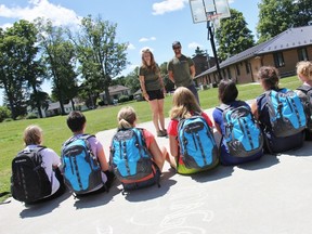 Anago girls with Outward Bound instructors Katie Manning and Ryan McNamee at Anago in Parkhill last week. ELENA MAYSTRUK/ AGE DISPATCH/ QMI AGENCY