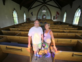 Doug and Janet Munn of Ottawa are the new owners of St. Andrew's Presbyterian Church West Huntingdon on Highway 62 in Centre Hastings, Ont., north of Belleville, Ont. The couple are seen inside what will eventually be their new full-time home Monday morning, July 21, 2014.  - Jerome Lessard/The Intelligencer/QMI Agency