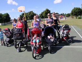 Some members of the Babes with Babes mom and bay boot camp that meet in Yorkview Park last week. Front row left to right: Stephanie Masschelein and son Graham, Wendy McConnell, Bethany McChesney, Sara Mackinnon. Back row: Aliya Scott, Nancy Cruz and Jenny Rose. ELENA MAYSTRUK/ AGE DISPATCH/ QMI AGENCY