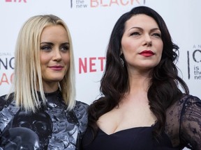 Cast members Laura Prepon (R) and Taylor Schilling attend the season two premiere of "Orange is the New Black" in New York May 15, 2014. REUTERS/ERIC THAYER