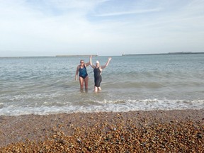 20-year-old Amber Thomas  (right) with her swim coach Marianne Alvarez (left) at the English Channel.