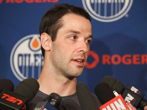 Left winger Benoit Pouliot speaks with media during an Edmonton Oilers press conference held at the Westin Hotel in Edmonton, Alta., on Tuesday, July 22, 2014. Pouliot comes to the Oilers from the New York Rangers. Ian Kucerak/Edmonton Sun/QMI Agency