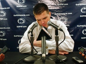 Penn State coach Jay Paterno talks to the media after their loss to the Wisconsin Badgers in their NCAA football game in Madison, Wisconsin November 26, 2011. Badgers defeated Penn State 45-7 to win their division. (REUTERS/Darren Hauck)