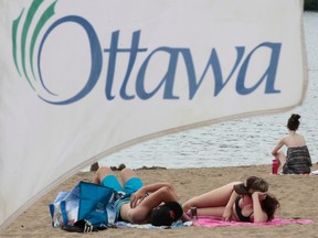 Hot weather sun seekers enjoyed the weather at Mooney's Bay Beach in Ottawa Tuesday July 22,  2014.  Tony Caldwell/Ottawa Sun/QMI Agency